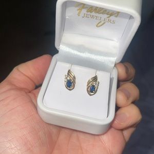 14k earrings with diamonds and sapphires.
